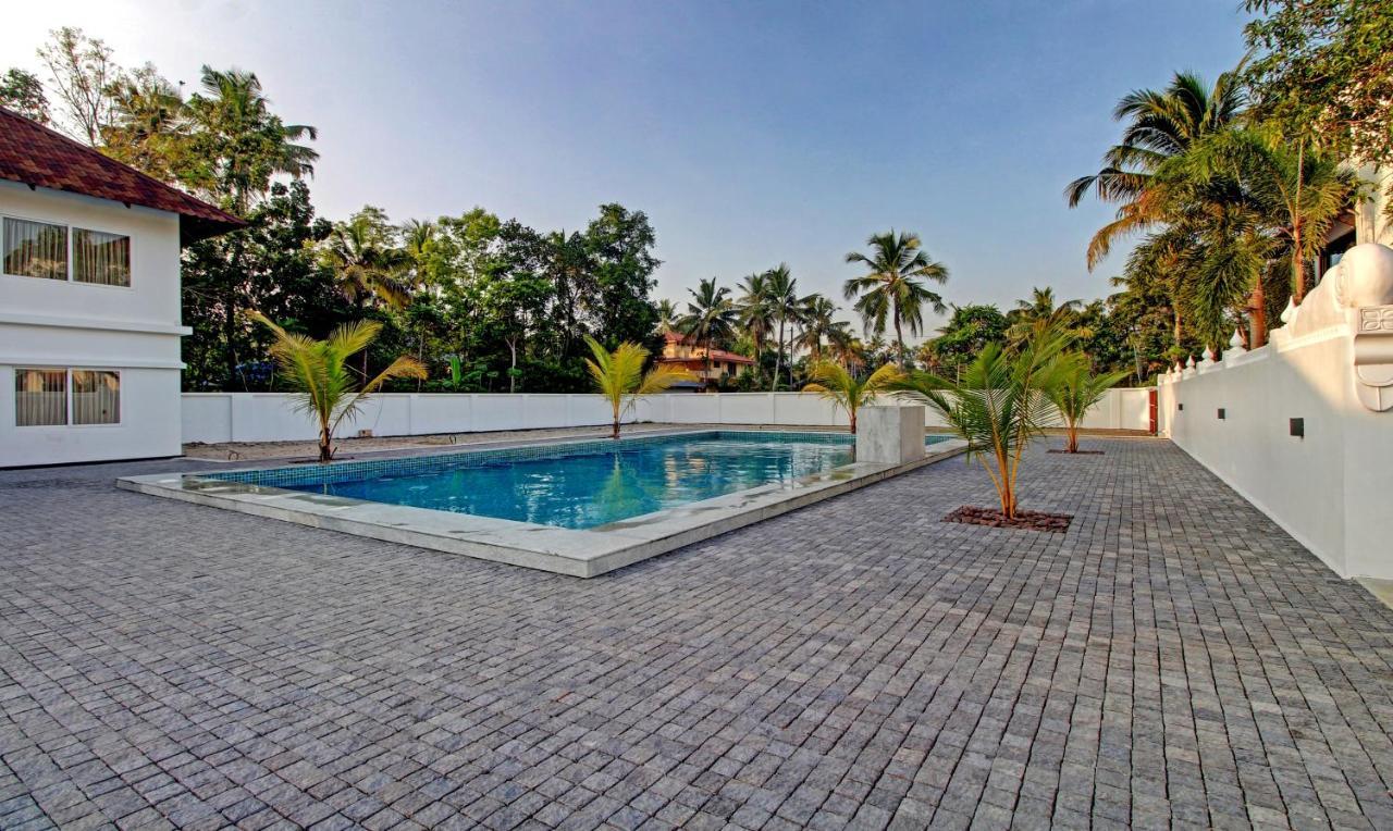 Treebo Premium Travancore Palace Cherthala Alappuzha Buitenkant foto
